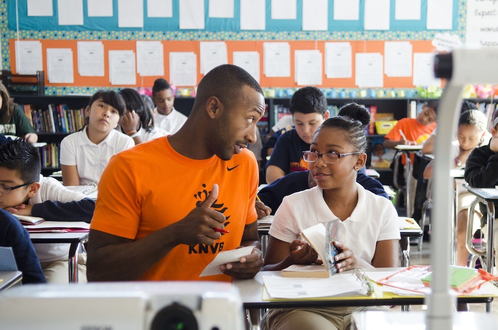 LaJon Survillion, a teacher at KIPP Bayview Academy in San Francisco, working with one of his bright, high-potential middle school students.